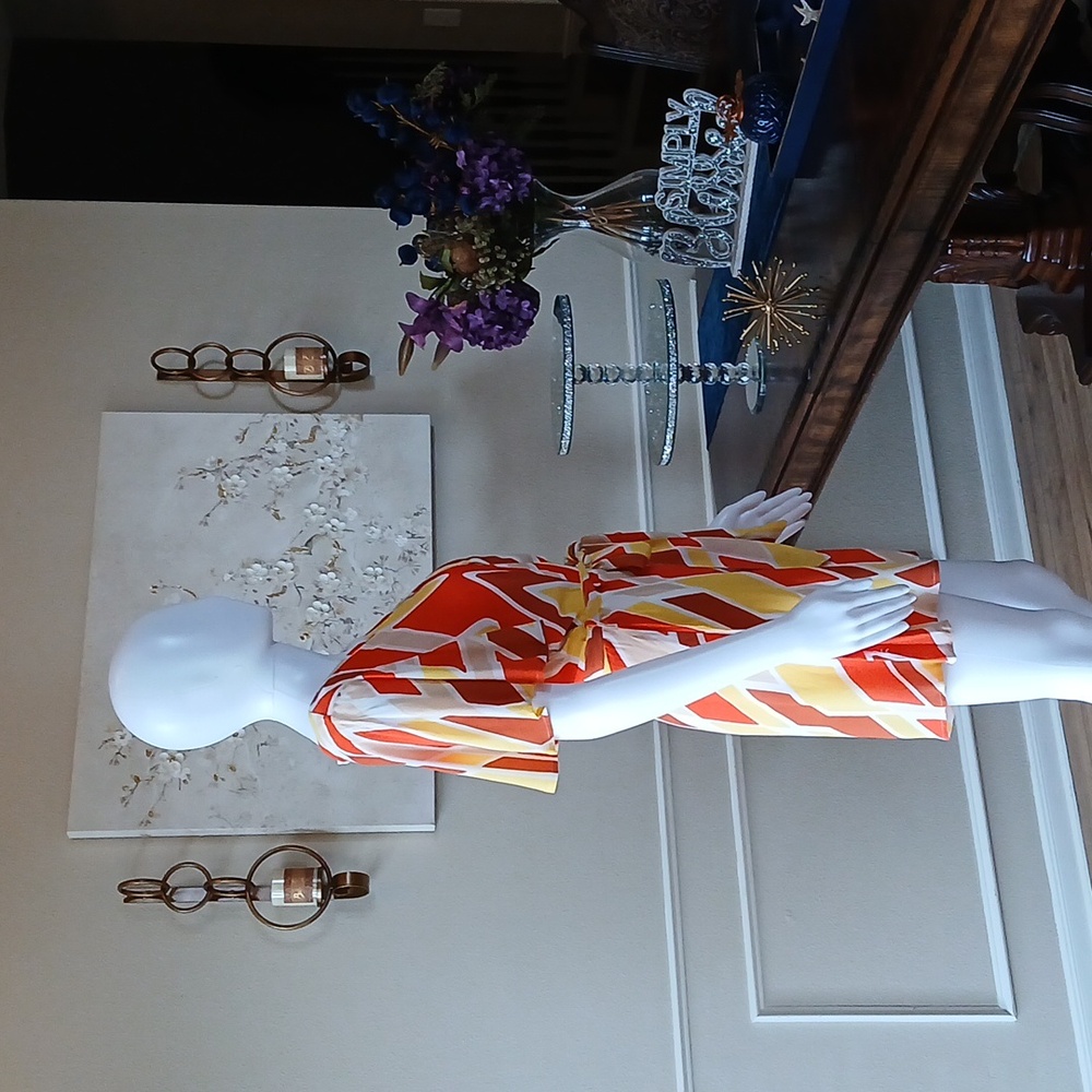 New Vibrant Orange and Yellow Patterned Wrap Mini Rorper. Size L - Picture 13 of 17